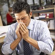Poslovna žena - Zaštite se od gripa na radnom mestu 